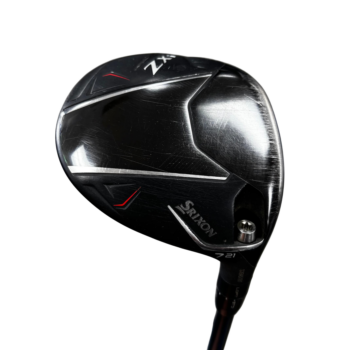 Close-up of a black Srixon Z-X golf club head with silver and red detailing, resting on a gray concrete surface.