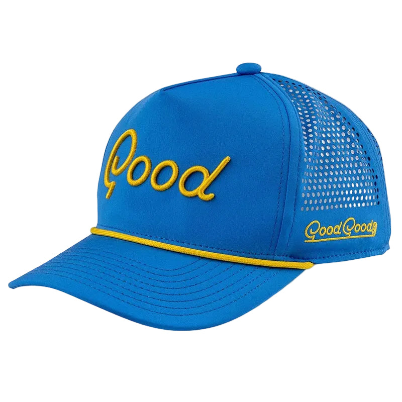 Blue cap with yellow mesh and 'Good Goody' branding on a light gray background