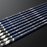 Set of golf shafts with Fujikura branding on a dark background