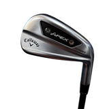 A Callaway Apex forged iron golf club head shown close-up, with the Callaway logo and Apex branding visible on the metallic clubface.