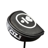 Black golf club head cover with white logo and text on a blurred background