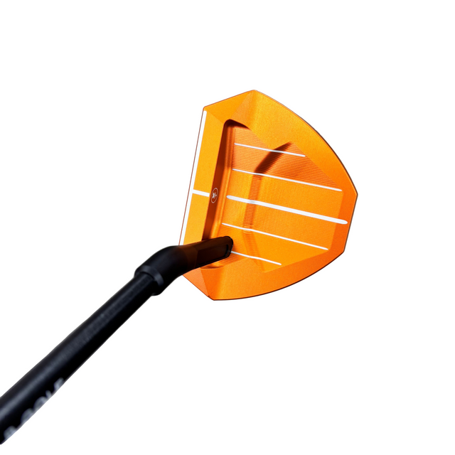 Orange paddle with black handle on a blurred indoor background