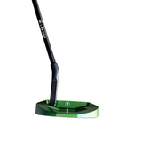 Close-up of a green golf putter head on a gray surface with a blurred background