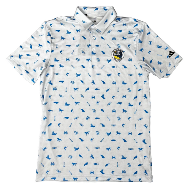 White polo shirt with blue patterns on a brown surface