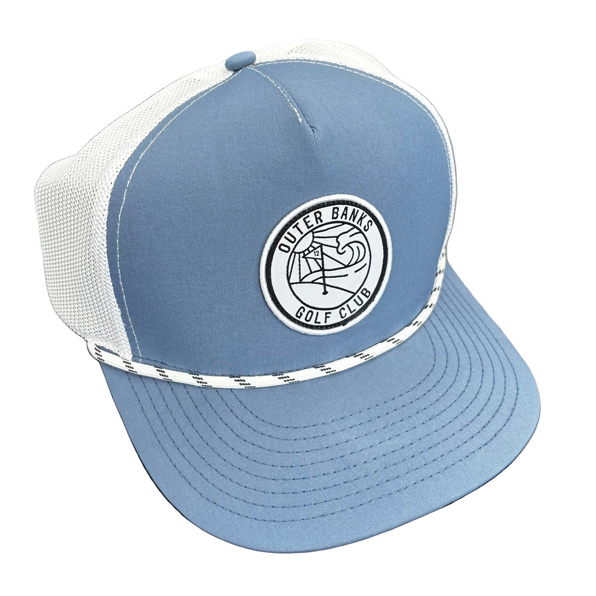 Blue cap with a logo on a black surface