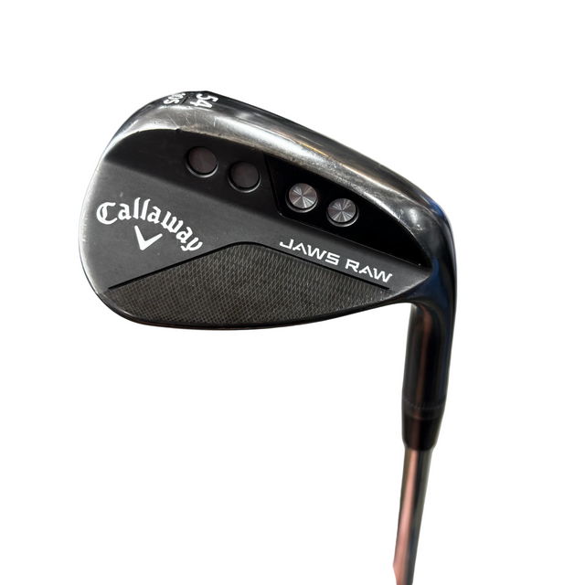 Callaway golf club head with 'JAWS RAW' on a blurred background