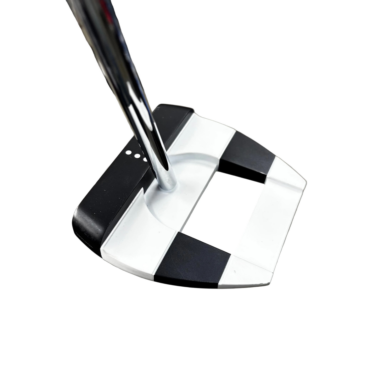 Golf putter with a black and white head on a blurred background