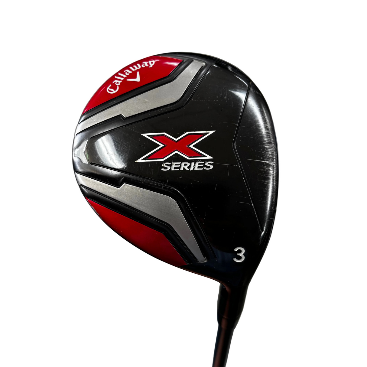 A Callaway X Series golf driver club head photographed close-up, showing the black, red, and silver clubface with the Callaway logo and model branding.