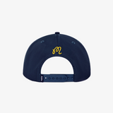 Navy blue cap with yellow logo on a light gray background