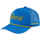 Blue cap with yellow mesh and 'Good Goody' branding on a light gray background